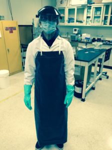 A person dressed in lab gear